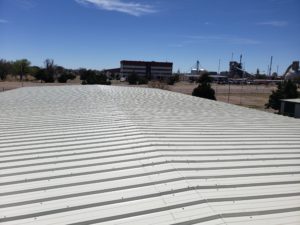 Commercial metal roof installation by CLC Roofing